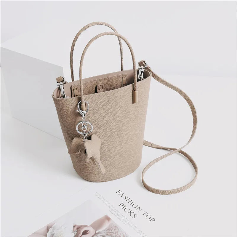 2024 Most Popular Togo Cowhide Leather Bucket Bag Small Neat All-match Elegant Women Shoulder Bag with Elephant Ornaments