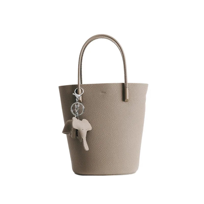 2024 Most Popular Togo Cowhide Leather Bucket Bag Small Neat All-match Elegant Women Shoulder Bag with Elephant Ornaments