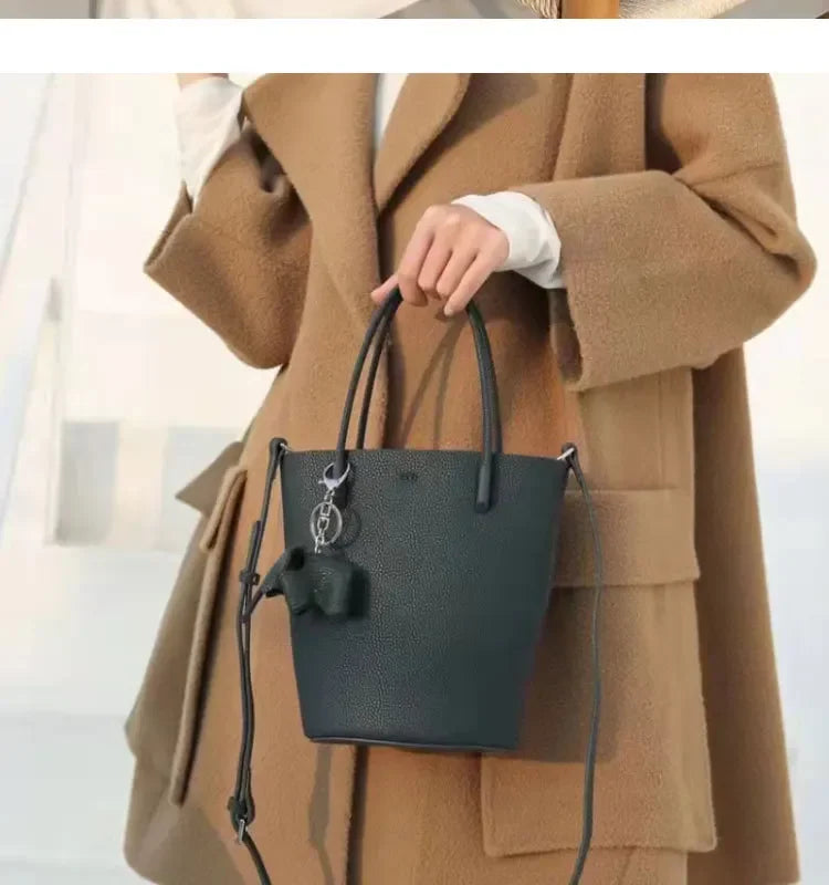 2024 Most Popular Togo Cowhide Leather Bucket Bag Small Neat All-match Elegant Women Shoulder Bag with Elephant Ornaments