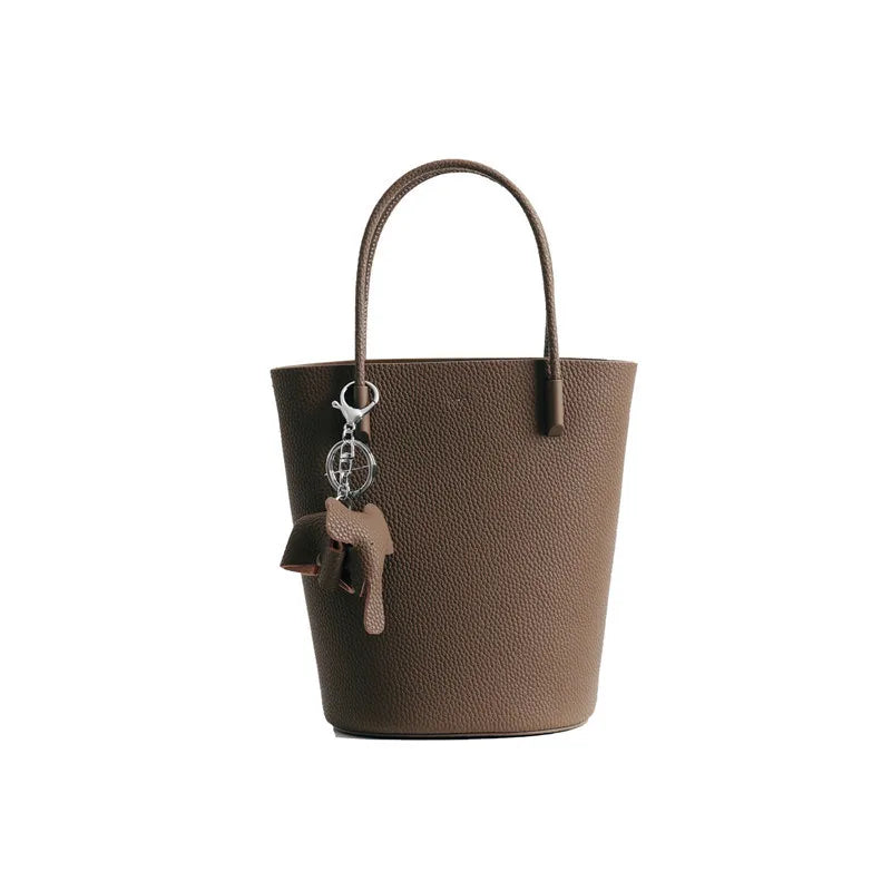 2024 Most Popular Togo Cowhide Leather Bucket Bag Small Neat All-match Elegant Women Shoulder Bag with Elephant Ornaments