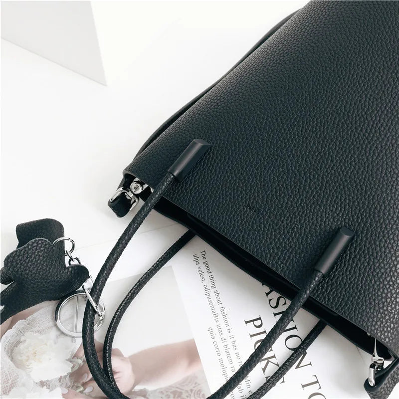 2024 Most Popular Togo Cowhide Leather Bucket Bag Small Neat All-match Elegant Women Shoulder Bag with Elephant Ornaments