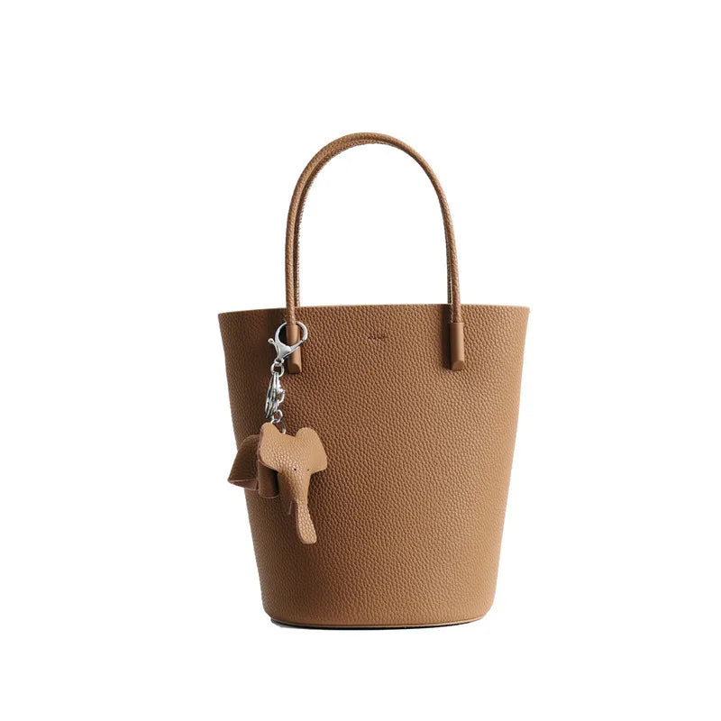 2024 Most Popular Togo Cowhide Leather Bucket Bag Small Neat All-match Elegant Women Shoulder Bag with Elephant Ornaments