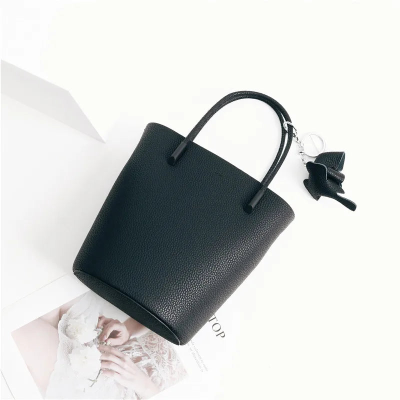 2024 Most Popular Togo Cowhide Leather Bucket Bag Small Neat All-match Elegant Women Shoulder Bag with Elephant Ornaments