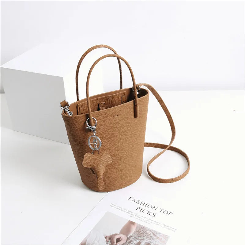 2024 Most Popular Togo Cowhide Leather Bucket Bag Small Neat All-match Elegant Women Shoulder Bag with Elephant Ornaments