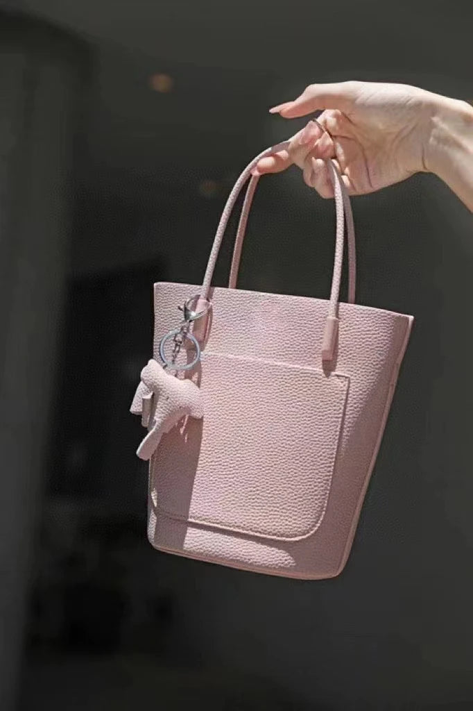 2024 Most Popular Togo Cowhide Leather Bucket Bag Small Neat All-match Elegant Women Shoulder Bag with Elephant Ornaments